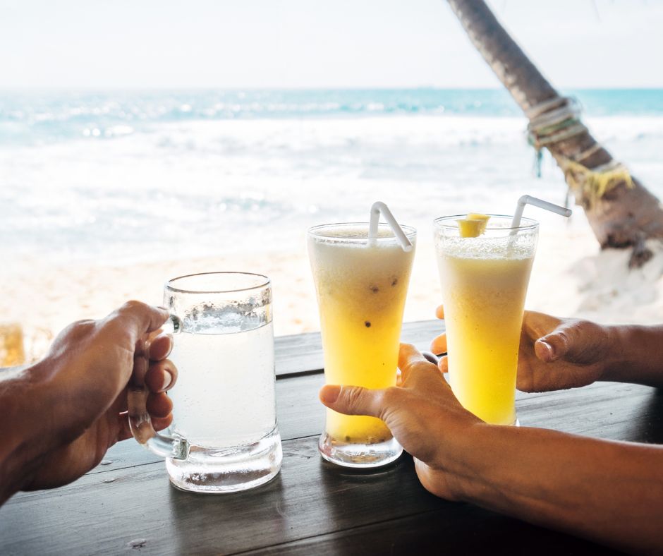 Untitled design (26) Enjoying a pineapple ginger cooler at the beach
